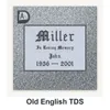 Old English TDS carved in granite