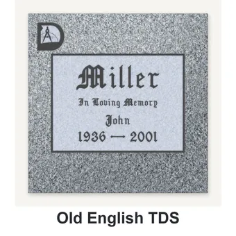Old English TDS carved in granite
