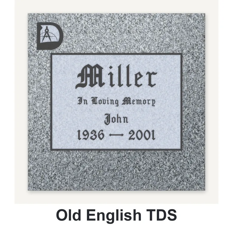 Old English TDS carved in granite